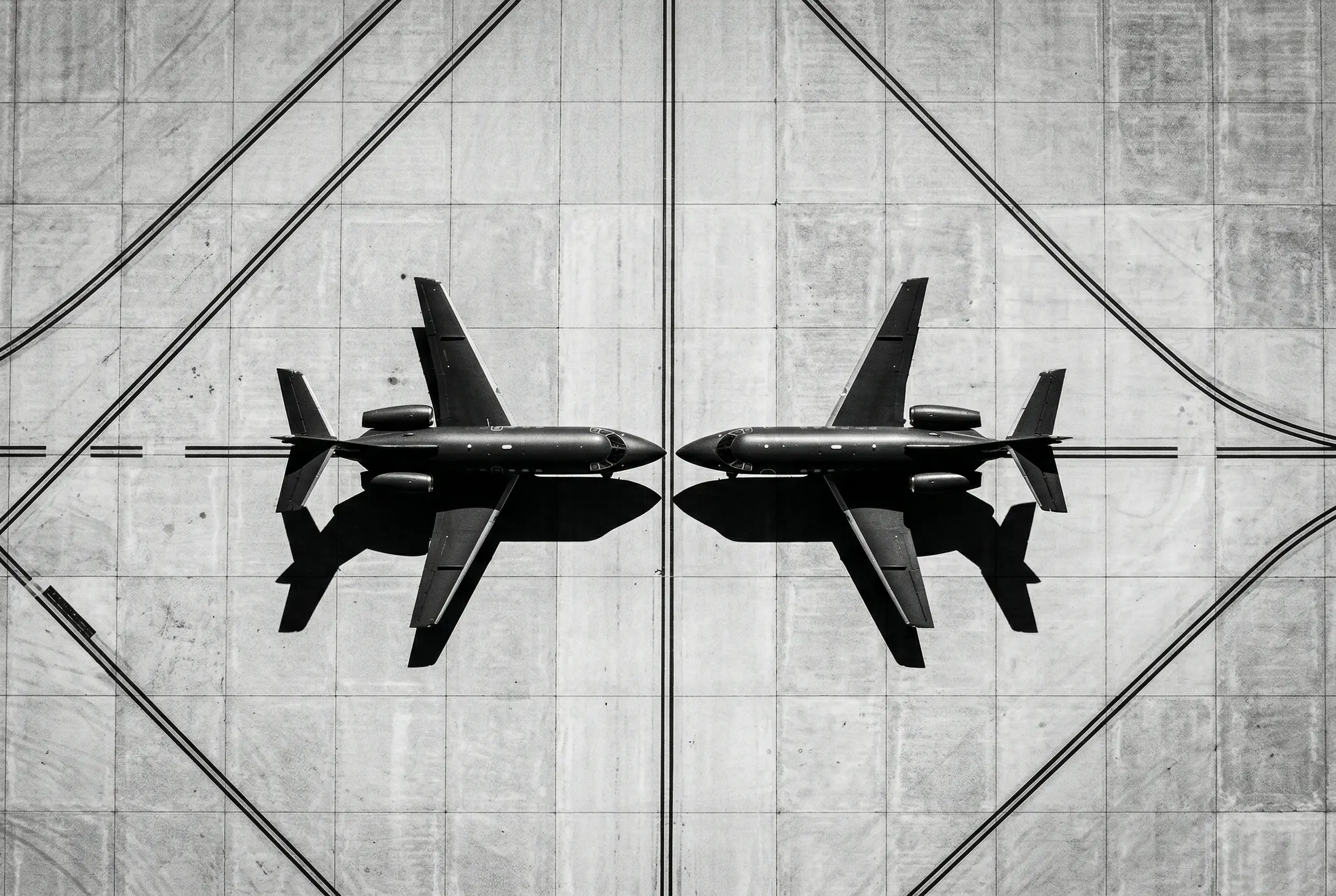 Hawker 800 series aircraft lined up on an airport ramp